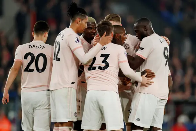 Romelu Lukaku celebrates with Manchester United team-mates