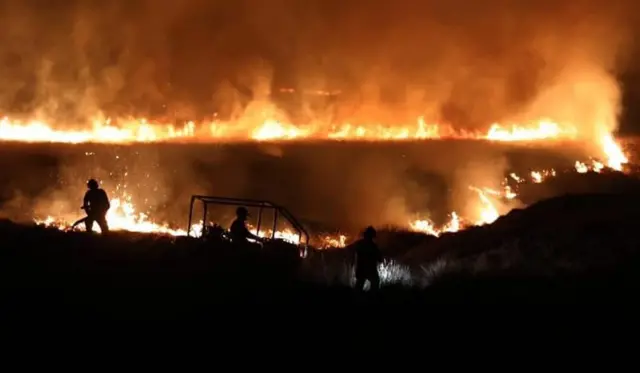 FIREFIGHTERS TACKLING BLAZE