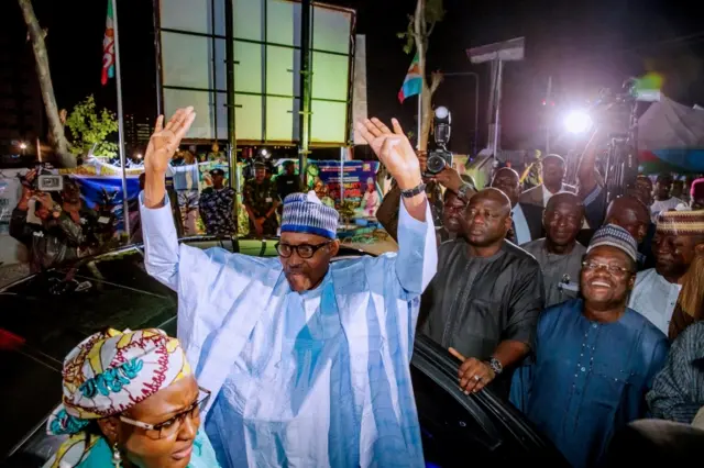 President Muhammadu Buhari greets his supporters at the campaign headquarters of All Progressives Congress (APC) in Abuja, Nigeria February 27, 2019. Bayo