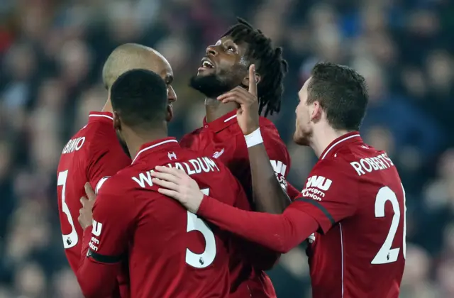 Divock Origi celebrates with Liverpool team-mates