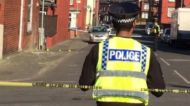 A police officer at the scene