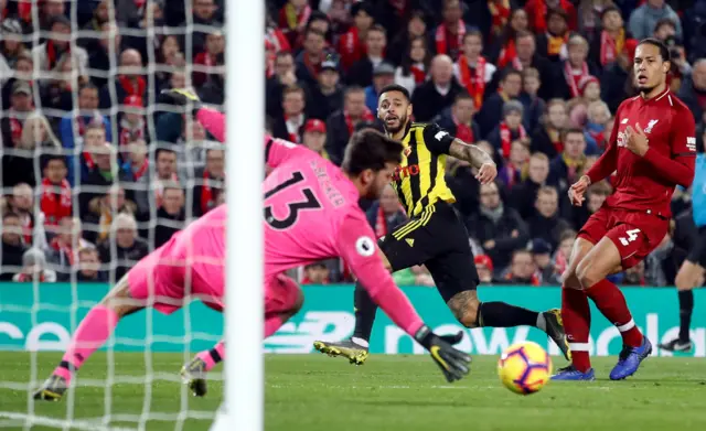 Alisson saves from Andre Gray