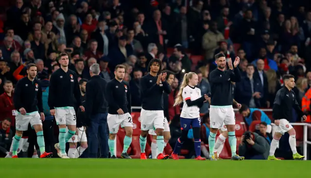 Players walk out at the Emirates