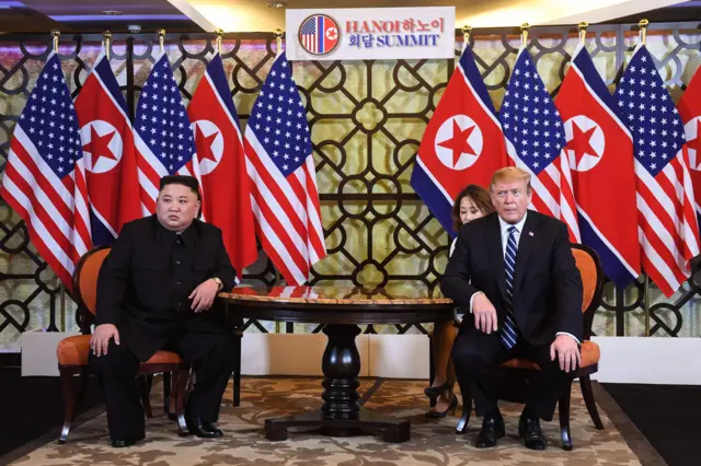 US President Donald Trump (L) holds a meeting with North Korea"s leader Kim Jong Un