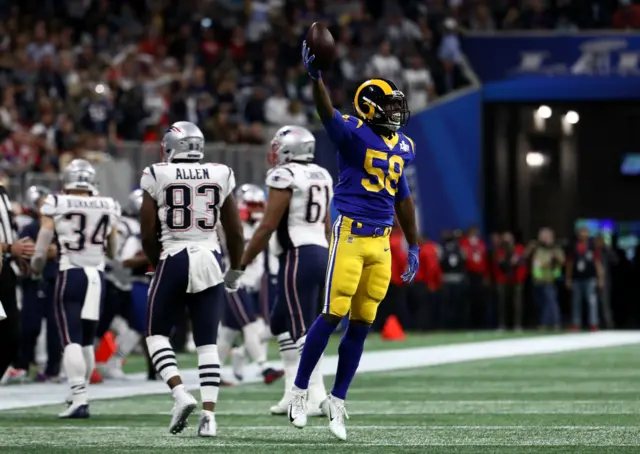 LA Rams celebrate their interception