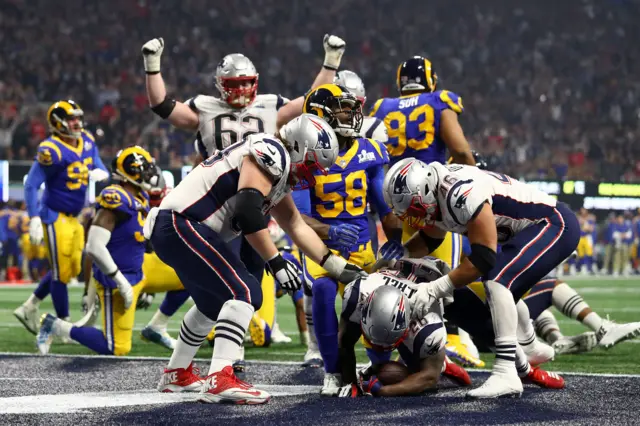 Sony Michel scores a touchdown for the New England Patriots