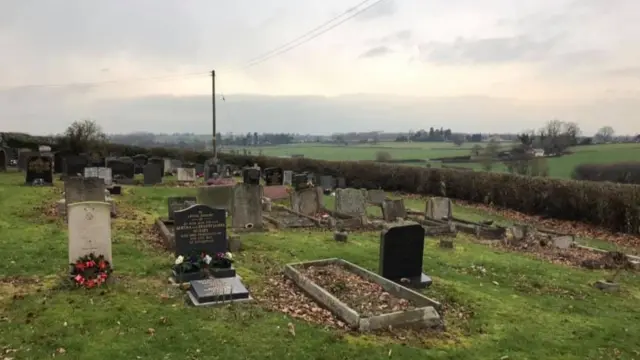 Graves at the church