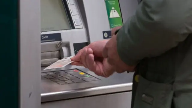 Man withdrawing money from an ATM