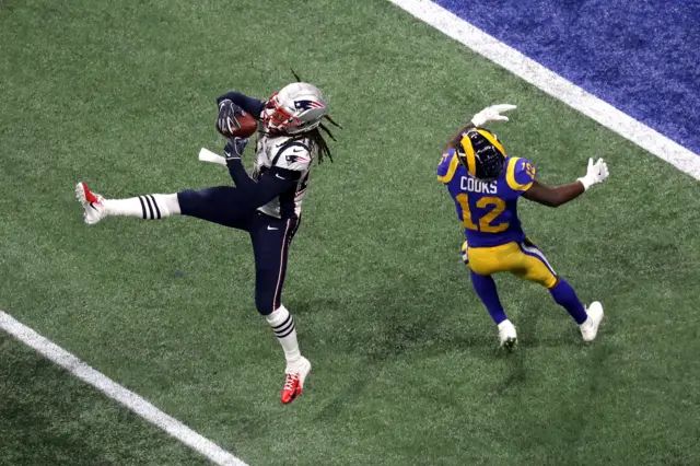 Stephon Gilmore intercepts the football