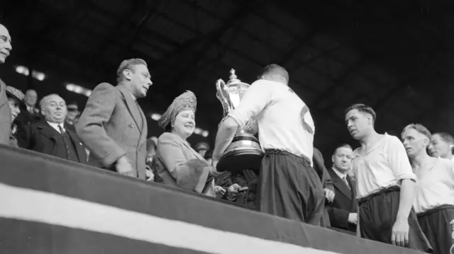 Derby County being presented with the FA Cup trophy in 1946