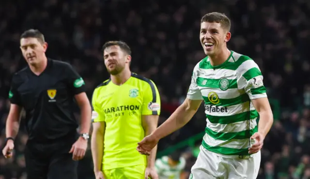 Ryan Christie celebrates his opening goal at Celtic Park