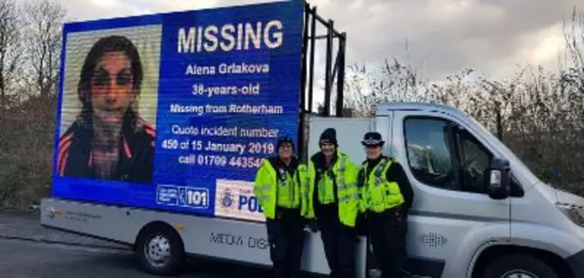 MISSING ALENA POSTER ON POLICE VAN