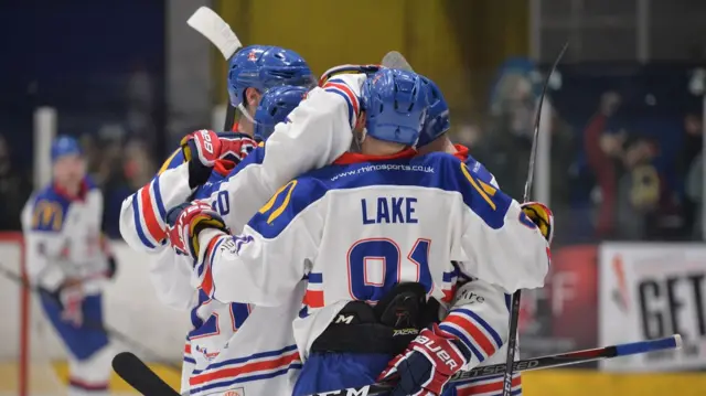 Ben Lake celebrates with other players