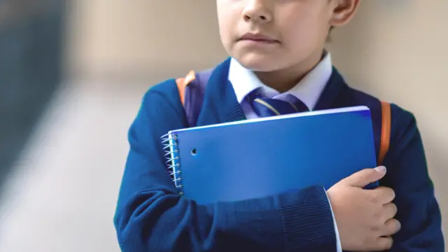 Child with workbook