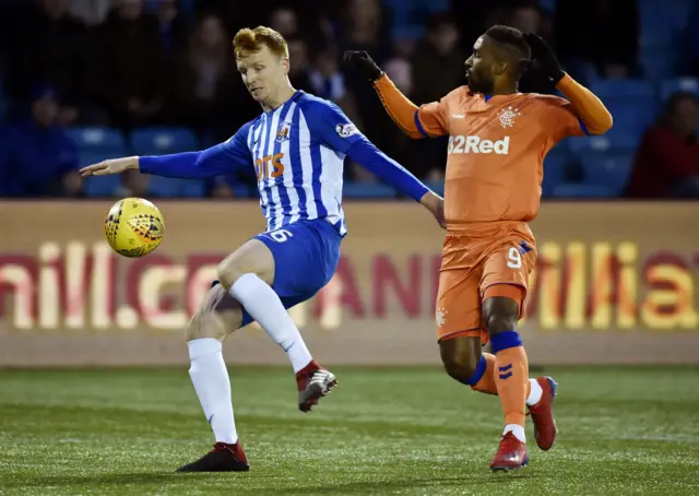 Steven Boyd shields the ball from Jermain Defoe