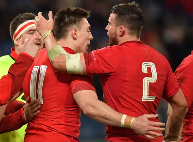 Josh Adams' and Wales celebrate