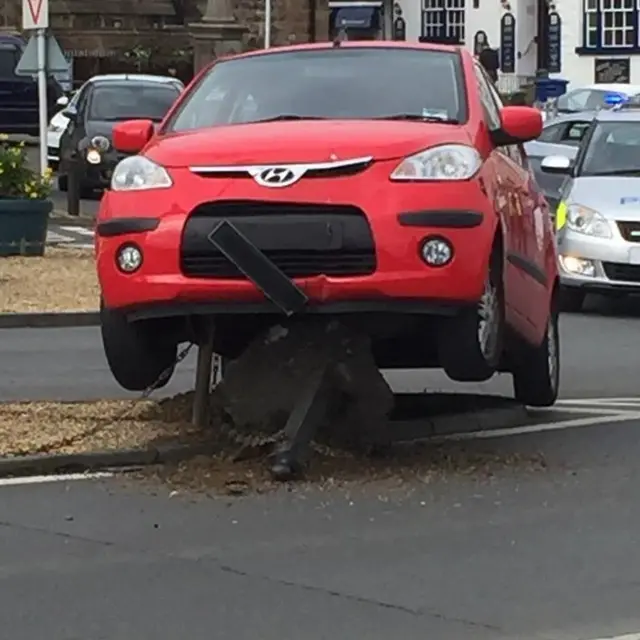 Car on bollard