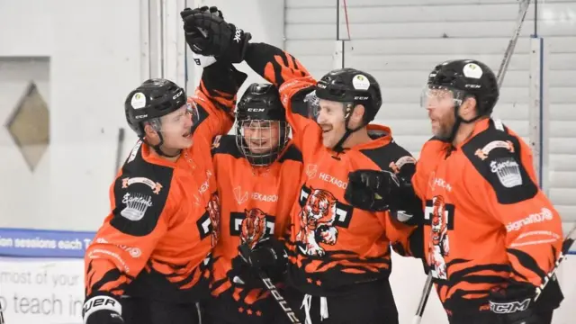 Tigers players celebrate