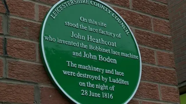 Green plaque