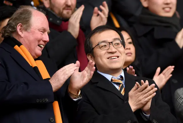 Wolves chairman Jeff Shi with former owner Steve Morgan