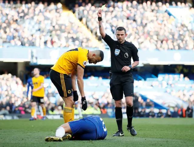 Romain Saiss booking