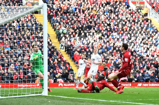 Sadio Mane shoots over from close range