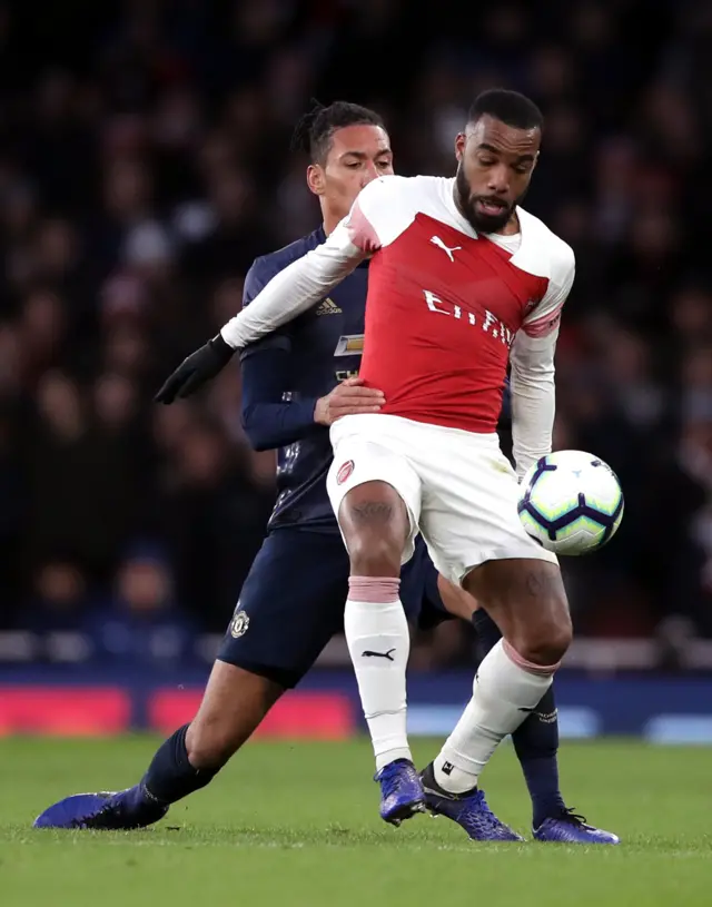 Chris Smalling and Alexandre Lacazette