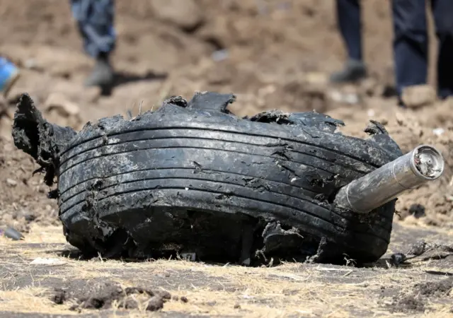 An aeroplane tyre is seen at the scene of the Ethiopian Airlines Flight ET 302 plane crash, near the town of Bishoftu