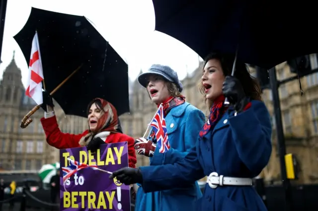 Demonstrators outside Parliament