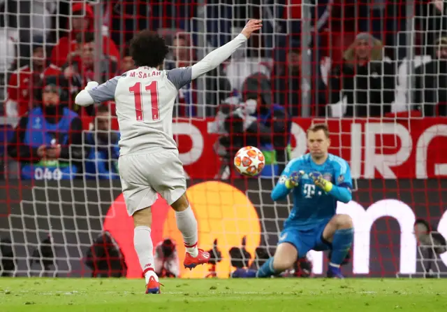 Mo Salah shiot is stopped by Manuel Neuer