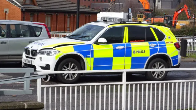 A damaged police car