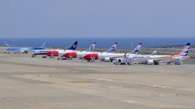 Planes grounded on a runway