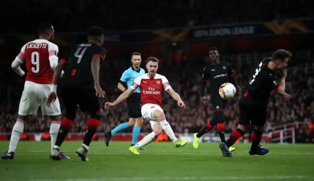 Aaron Ramsey shoots at goal