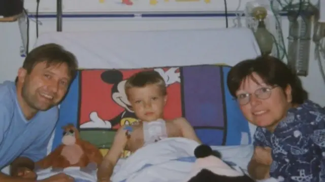 Tommy and parents in hospital