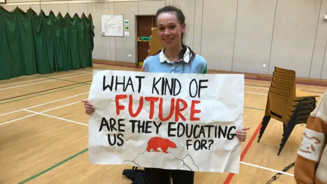 Student with a sign