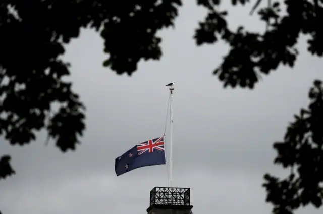 The national flag of New Zealand at half-mast near the Al Noor mosque after Friday's attacks in Christchurch