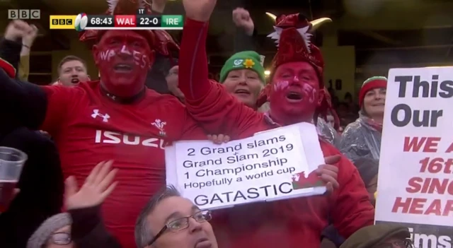 Wales fans with a sign saying 'Gatastic'