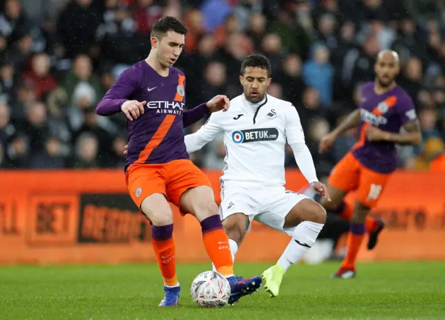 Aymeric Laporte and Wayne Routledge