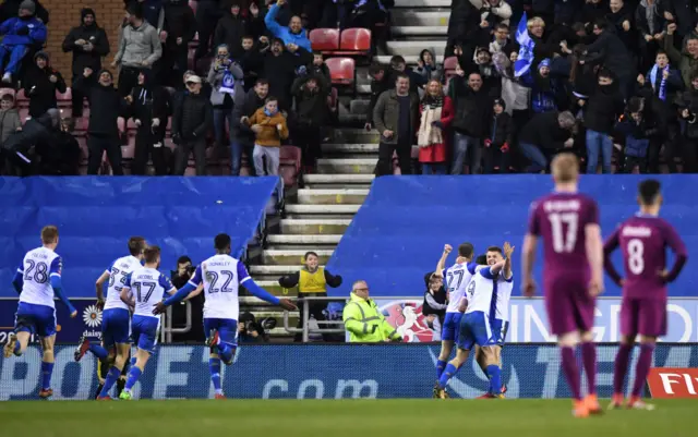 Will Grigg scores for Wigan against Man City