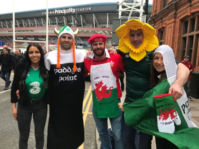 A group of Ireland and Wales fans in fancy dress