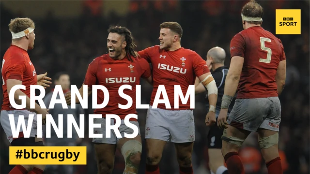 Wales players celebrate with the words: 'Grand Slam Winners' over the picture