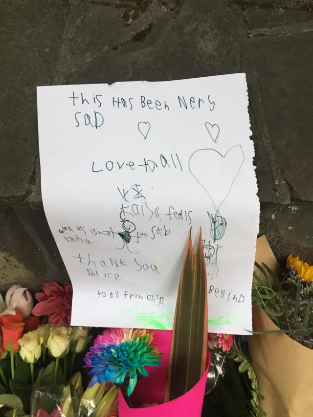 A notice in child's handwriting saying the day has been very sad and thanking police