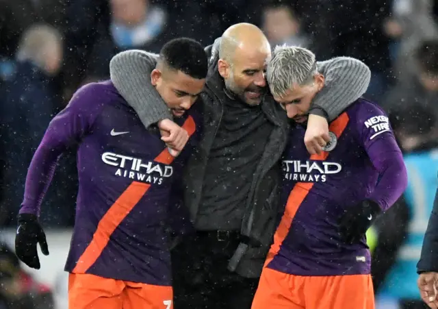 Manchester City's Sergio Aguero and Gabriel Jesus with manager Pep Guardiola