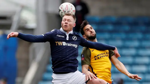 Millwall's Aiden O'Brien in action with Brighton"s Martin Montoya