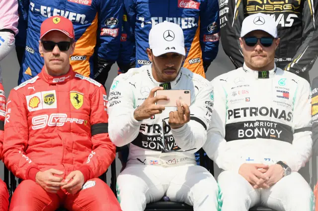 Sebastian Vettel, Lewis Hamilton and Lewis Hamilton