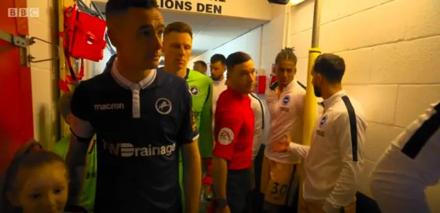 Millwall and Brighton players in the tunnel