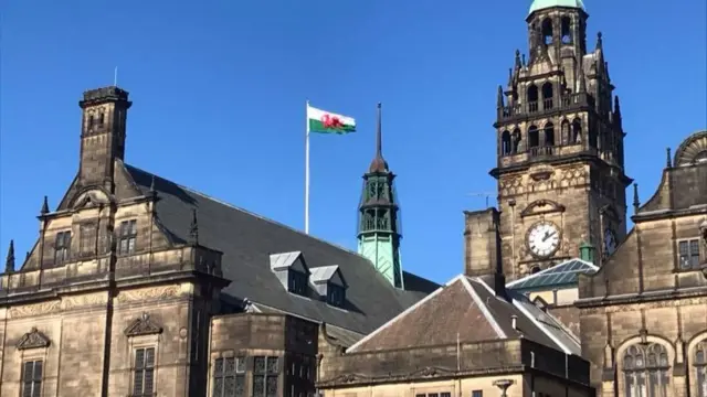 A Welsh flag above Sheffield Town Hall