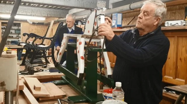 Derek Caldow restores a rocking horse that was given to the Men's Shed