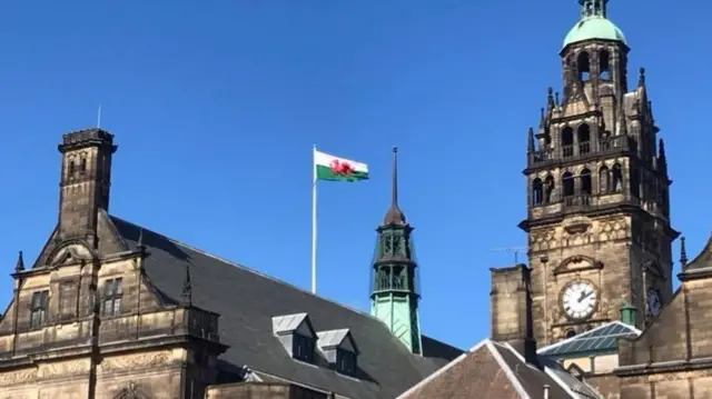 The flag above the town hall