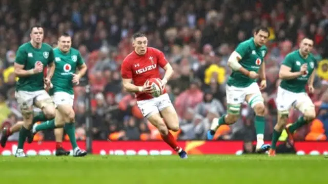 Josh Adams with ball in hand against Ireland